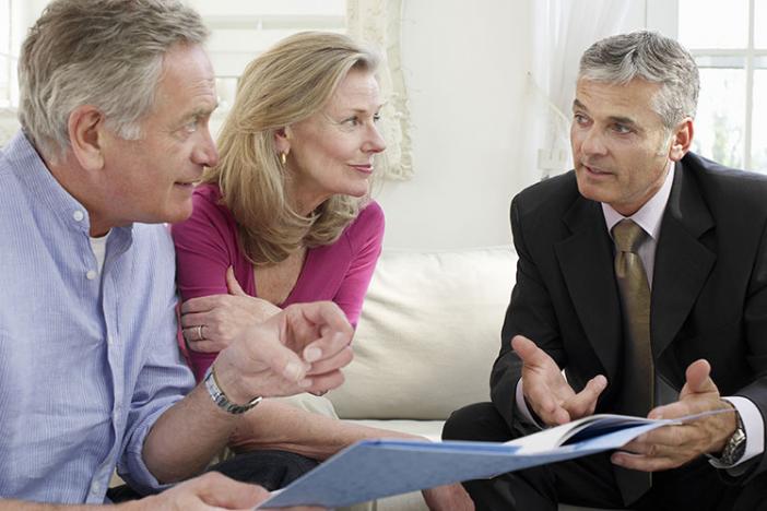 Couple talking to an advisor